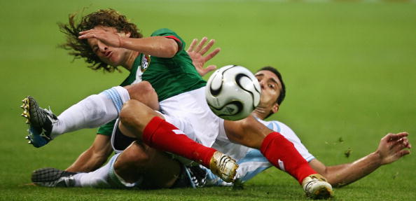 Mexican defender Andres Guardado (L) is