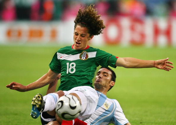 Mexican defender Andres Guardado (L) is